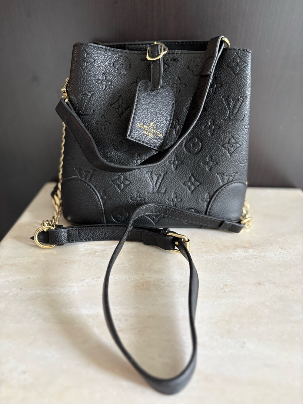 Louis Vuitton Black Monogram-Embossed Crossbody Bucket Bag with Gold Hardware
